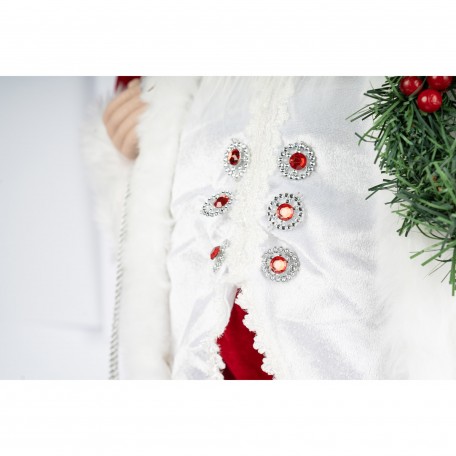 Dekorativer Roter Weihnachtsmann mit Kranz und Beeren Dekorativer Roter Weihnachtsmann mit Kranz und Beeren