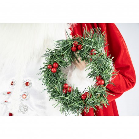 Dekorativer Roter Weihnachtsmann mit Kranz und Beeren Dekorativer Roter Weihnachtsmann mit Kranz und Beeren
