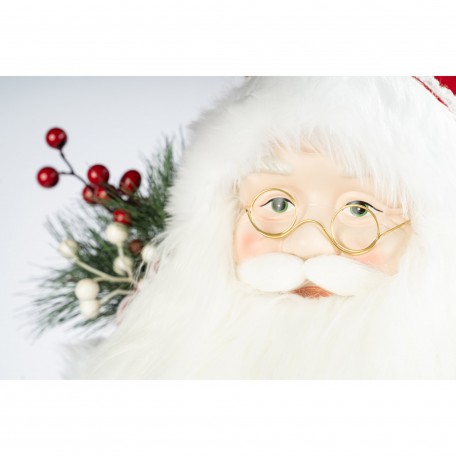 Dekorativer Roter Weihnachtsmann mit Kranz und Beeren Dekorativer Roter Weihnachtsmann mit Kranz und Beeren