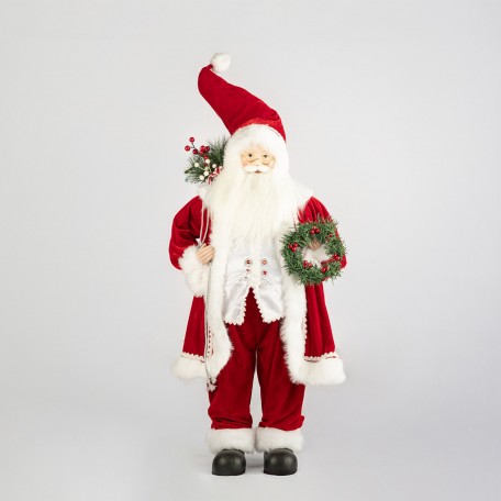 Dekorativer Roter Weihnachtsmann mit Kranz und Beeren Dekorativer Roter Weihnachtsmann mit Kranz und Beeren