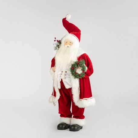 Dekorativer Roter Weihnachtsmann mit Kranz und Beeren Dekorativer Roter Weihnachtsmann mit Kranz und Beeren